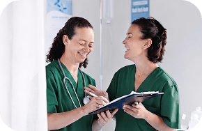 Nurses talking in corridor