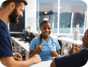 Nurses reviewing tablet screen